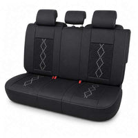 Huse auto premium 5 locuri Carguard Deluxe piele ecologică perforată și textil - negru - alb