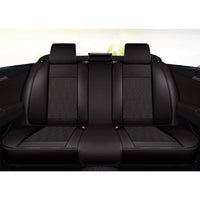 Huse auto premium 5 locuri Carguard Deluxe piele ecologică perforată - negru - alb