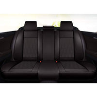 Huse auto premium 5 locuri Carguard Deluxe piele ecologică perforată - negru