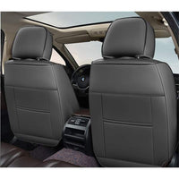 Huse auto premium 5 locuri Carguard Deluxe piele ecologică perforată și textil - negru - alb