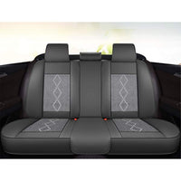 Huse auto premium 5 locuri Carguard Deluxe piele ecologică perforată și textil - negru - alb